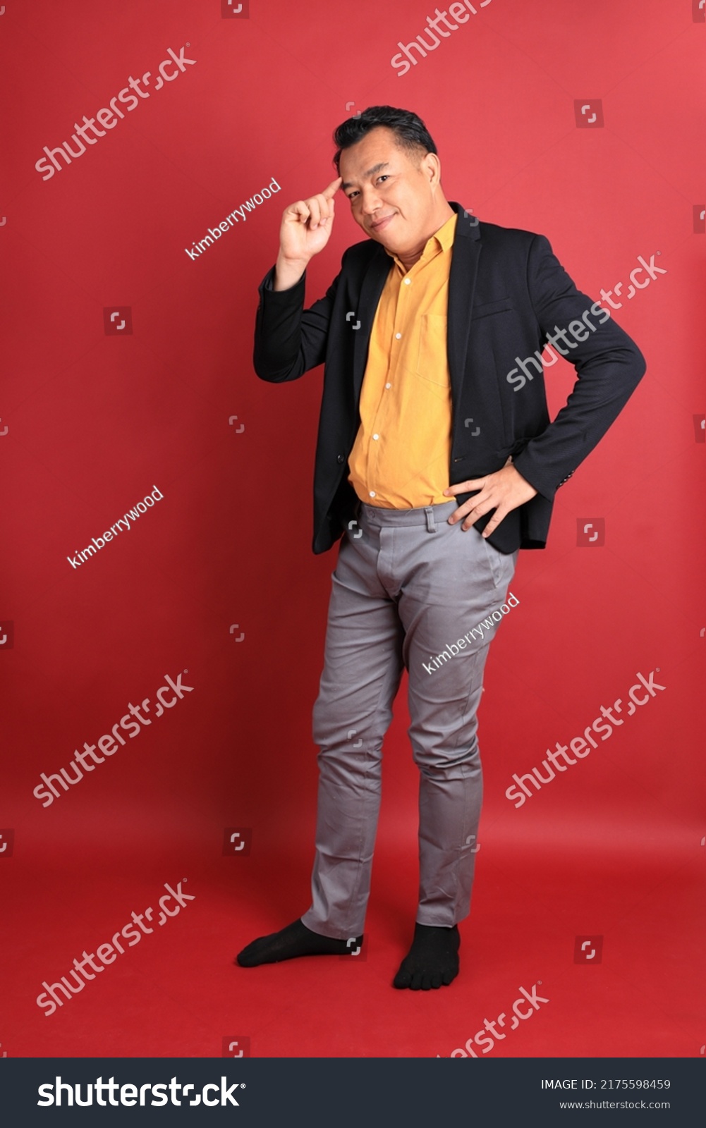 Asian Middle Aged Man Standing On Stock Photo 2175598459 | Shutterstock