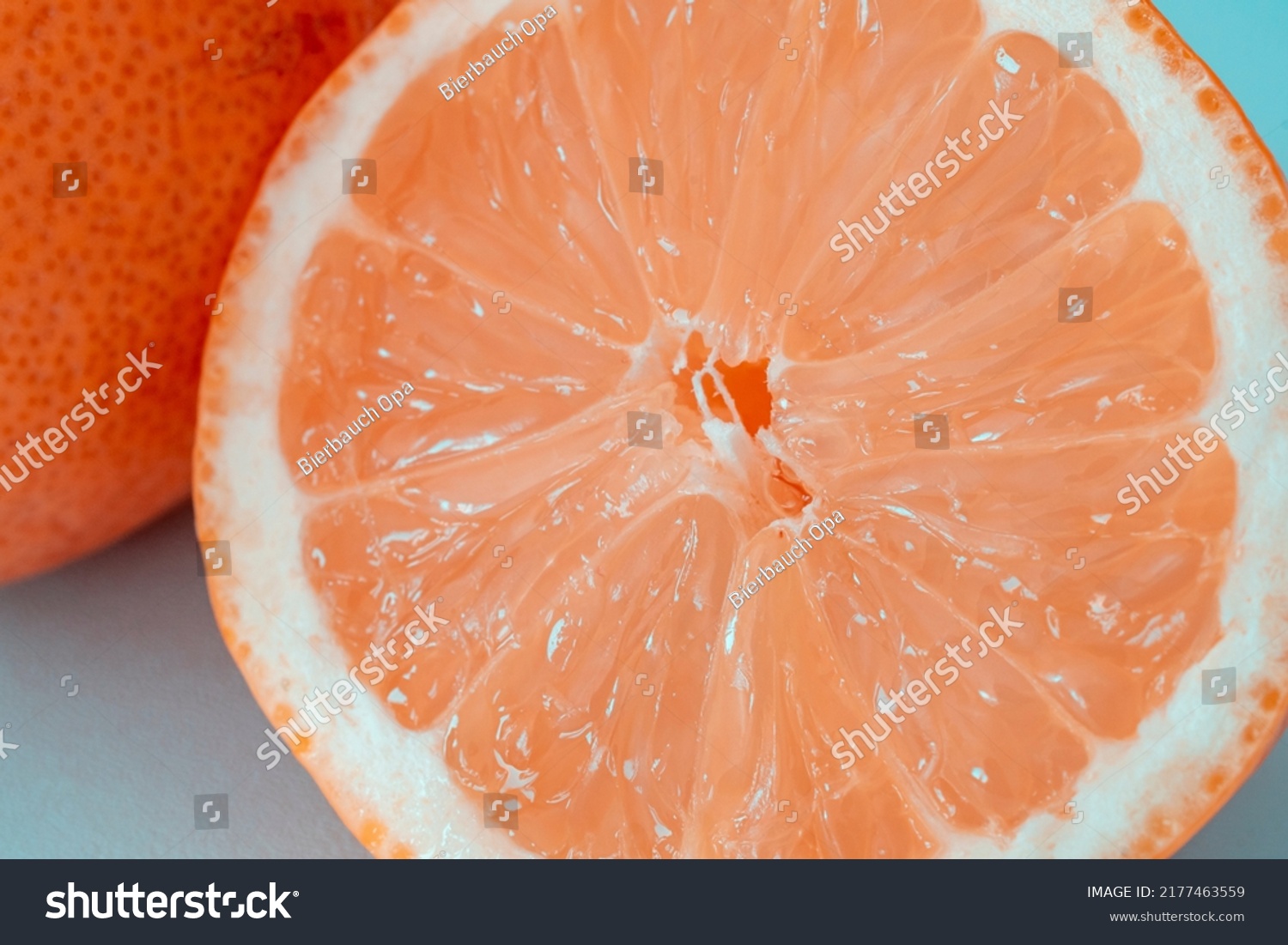 Fresh Grapefruit Slice Isolated On Blue库存照片2177463559 | Shutterstock