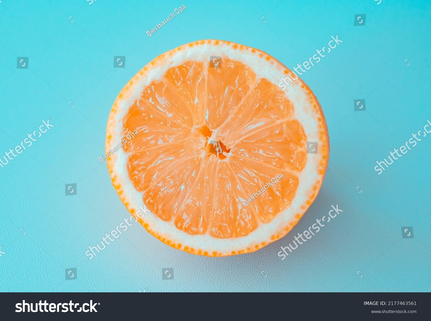 Fresh Grapefruit Slice Isolated On Blue库存照片2177463561 | Shutterstock