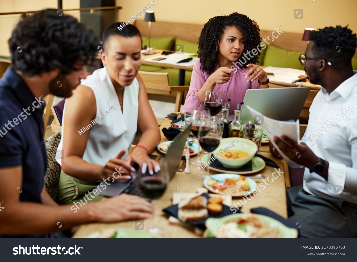 Group Multicultural Managers Sitting Restaurant Dinner Stock Photo ...