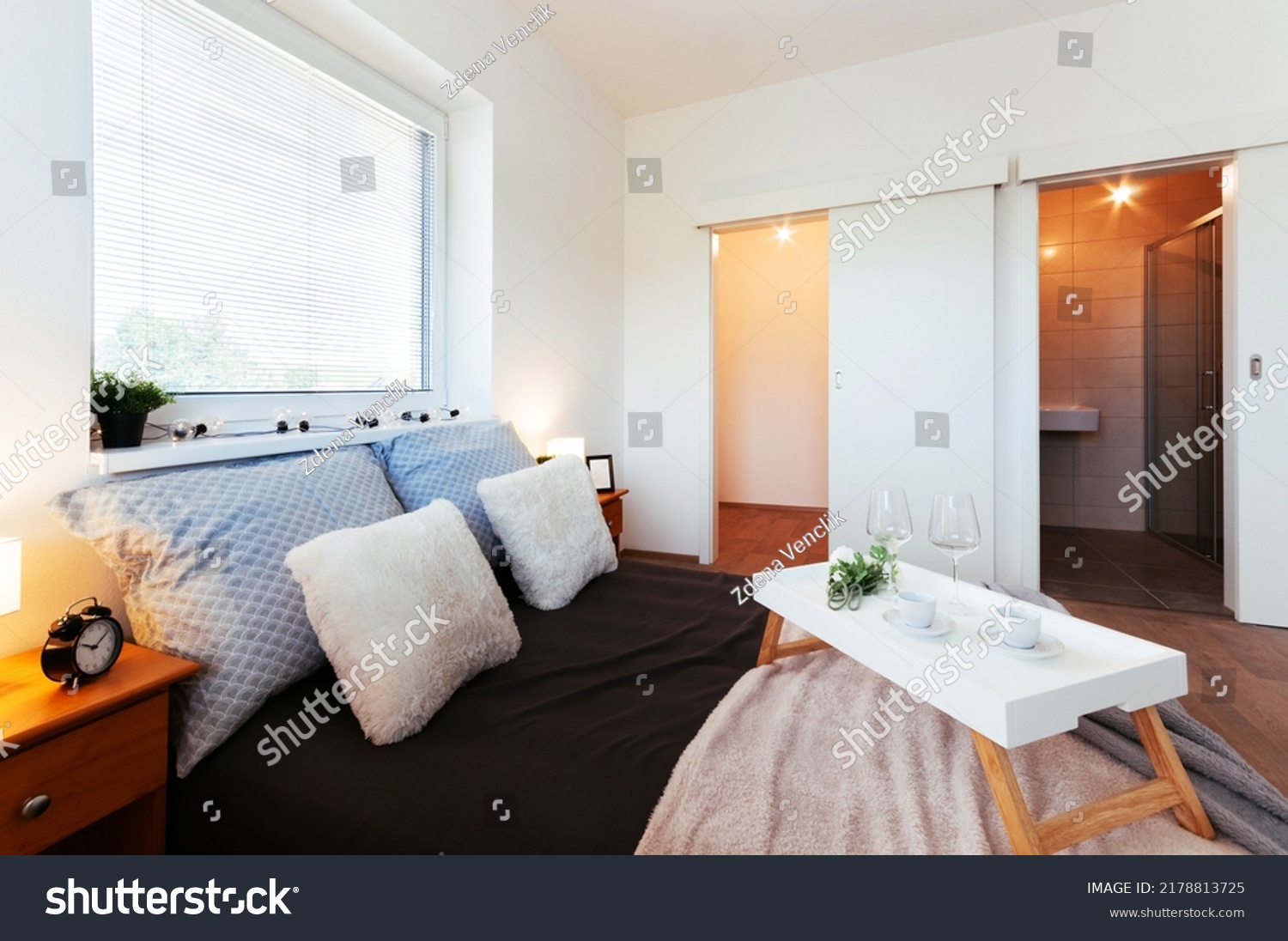 Simple Bedroom Apartment Walkin Closet Small Stock Photo 2178813725   Stock Photo Simple Bedroom In Apartment With Walk In Closet And Small Bathroom Hidden Behind Sliding Door In 2178813725 