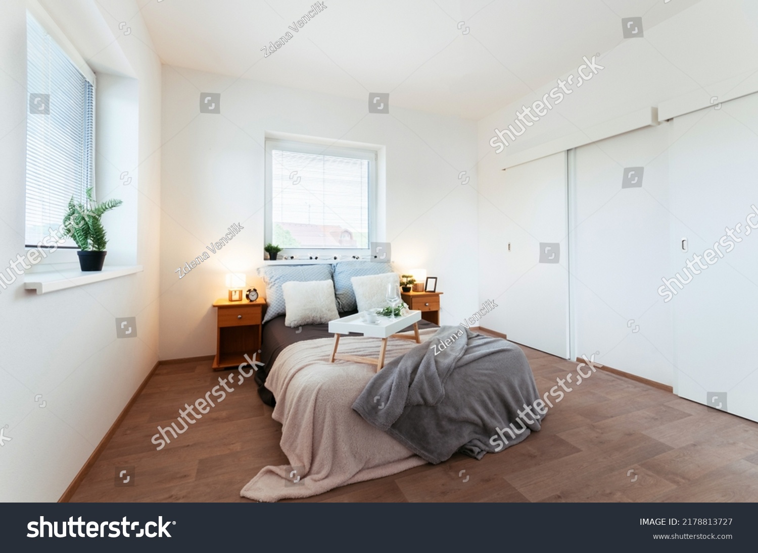 Simple Bedroom Apartment Walkin Closet Small Stock Photo 2178813727   Stock Photo Simple Bedroom In Apartment With Walk In Closet And Small Bathroom Hidden Behind Sliding Door In 2178813727 