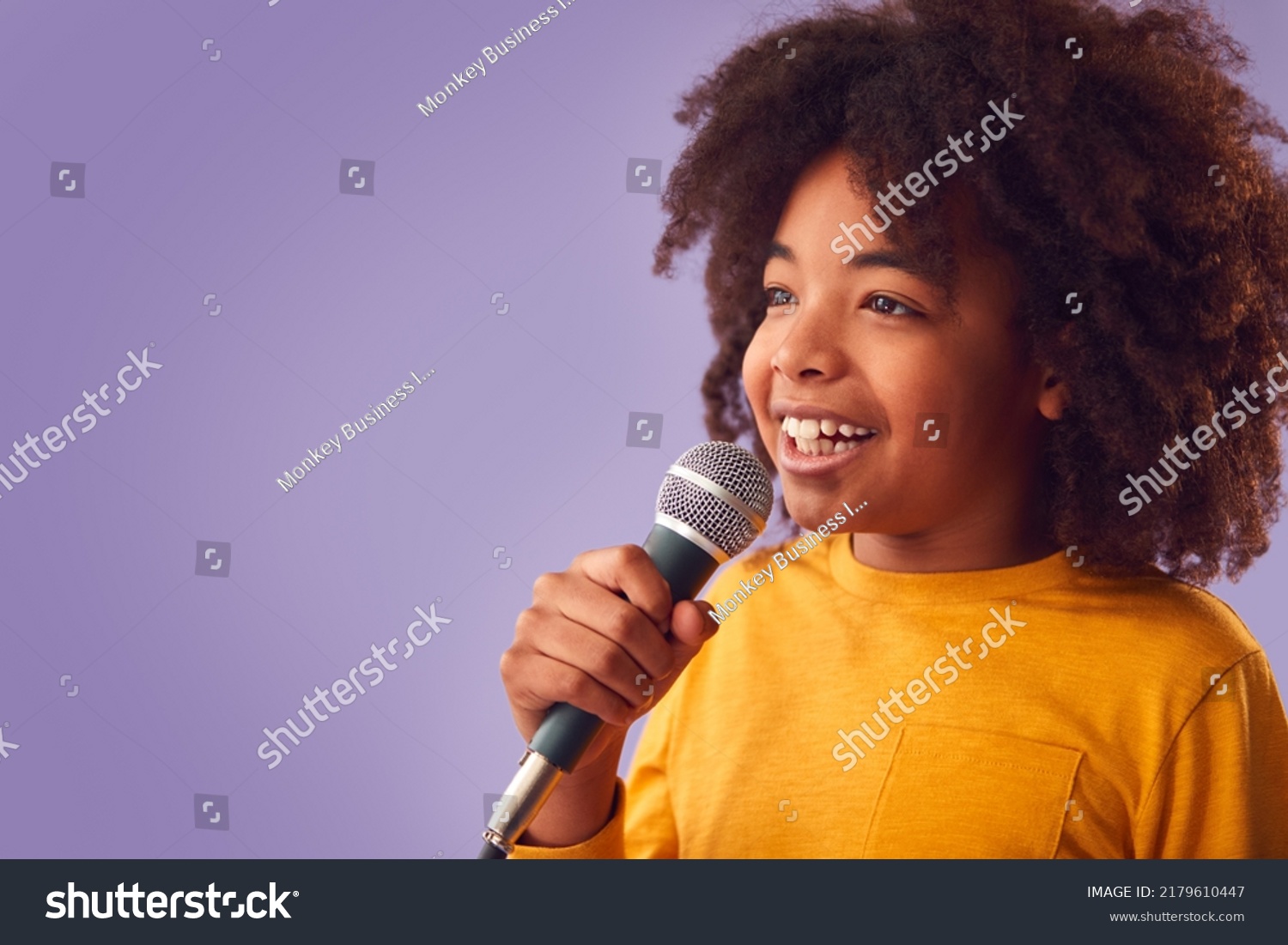 Studio Shot Boy Singing Karaoke Into Stock Photo 2179610447 Shutterstock