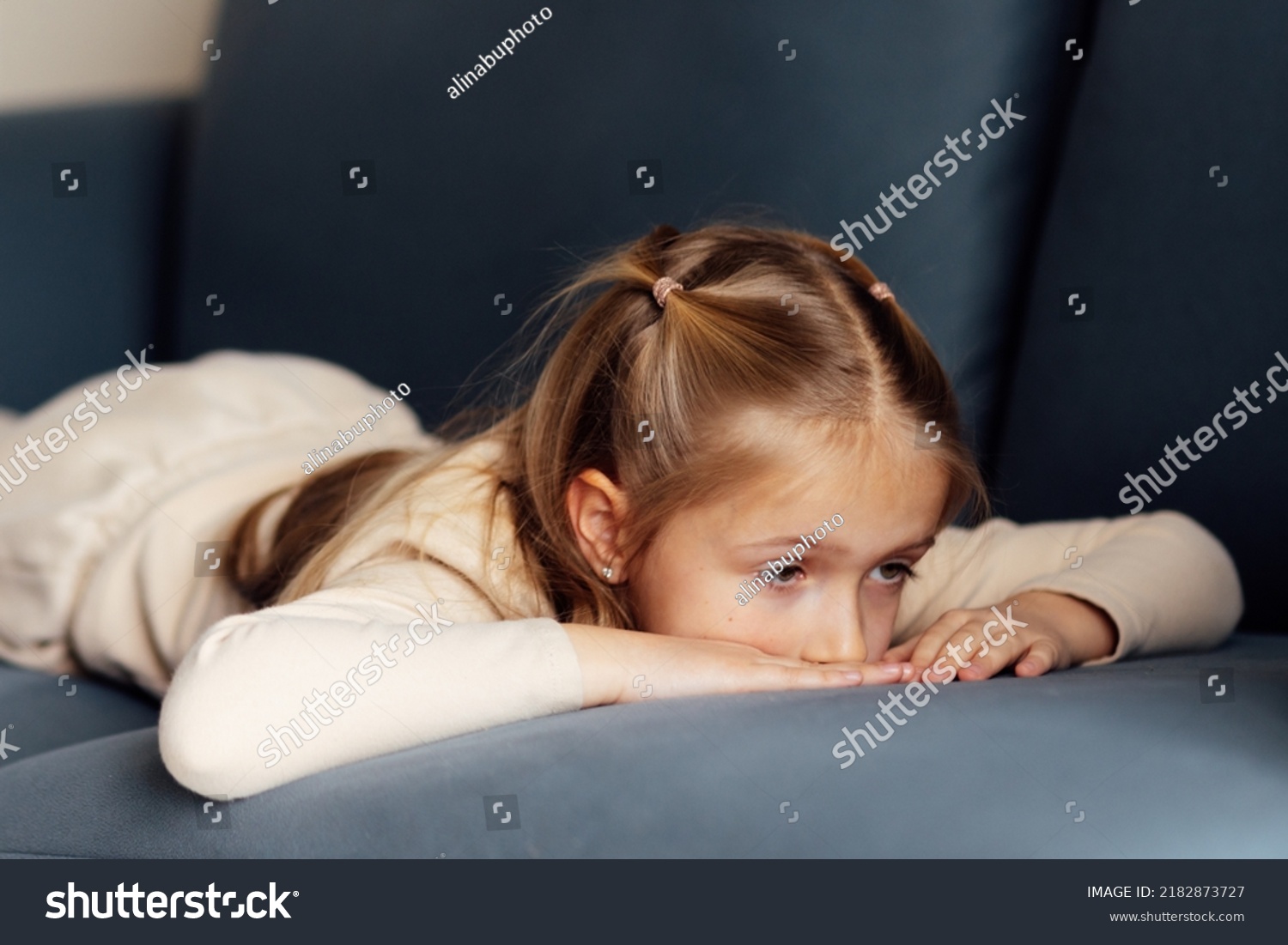 Sad Little Caucasian Girl Lying Alone Stock Photo 2182873727 | Shutterstock