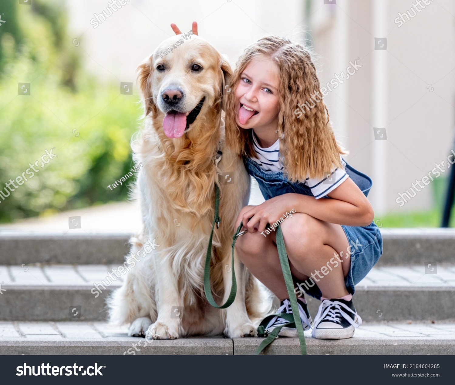 Preteen Girl Hugging Golden Retriever Dog Stock Photo 2184604285 ...