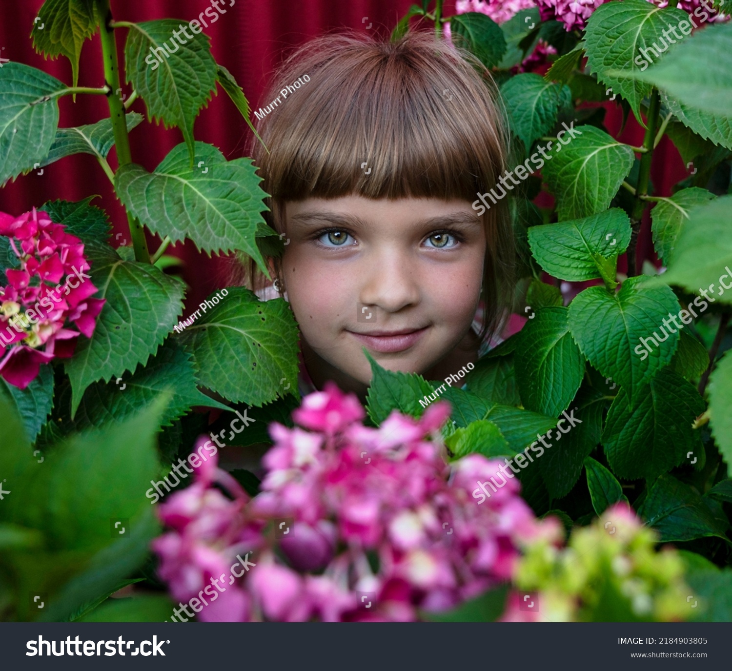 girl-10-years-old-flowers-stock-photo-2184903805-shutterstock