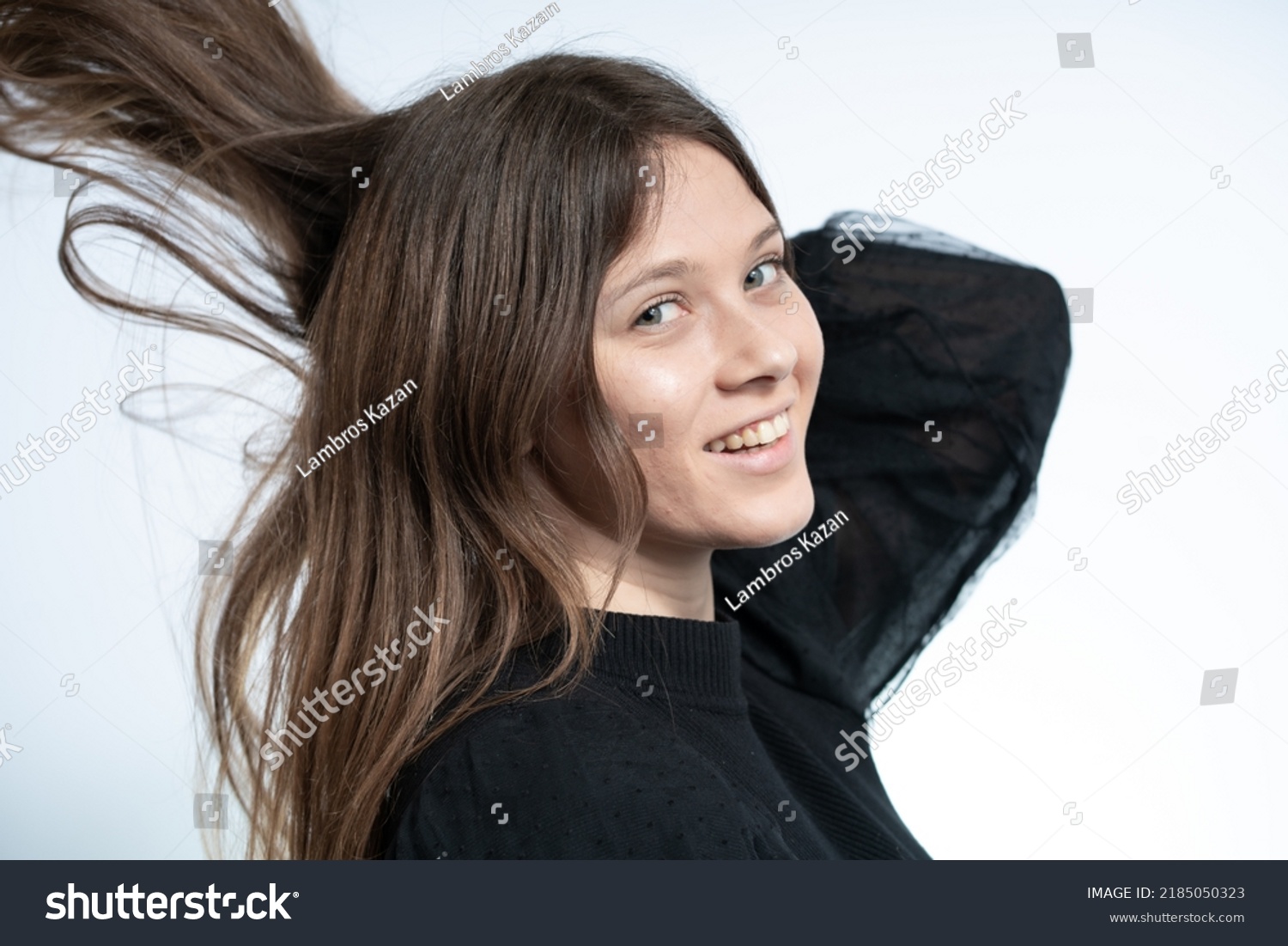 happy-young-woman-attitude-wearing-black-stock-photo-2185050323