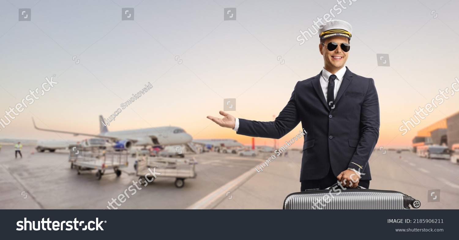 Pilot Carrying Suitcase Pointing Airport Apron Stock Photo 2185906211 ...