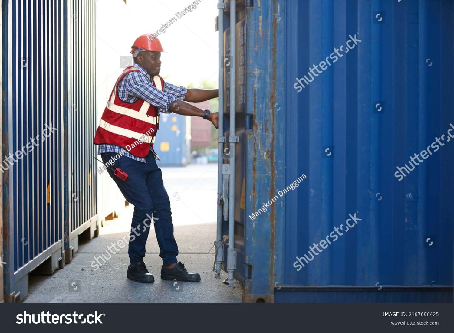 African Factory Worker Foreman Opening Container Stock Photo 2187696425 ...