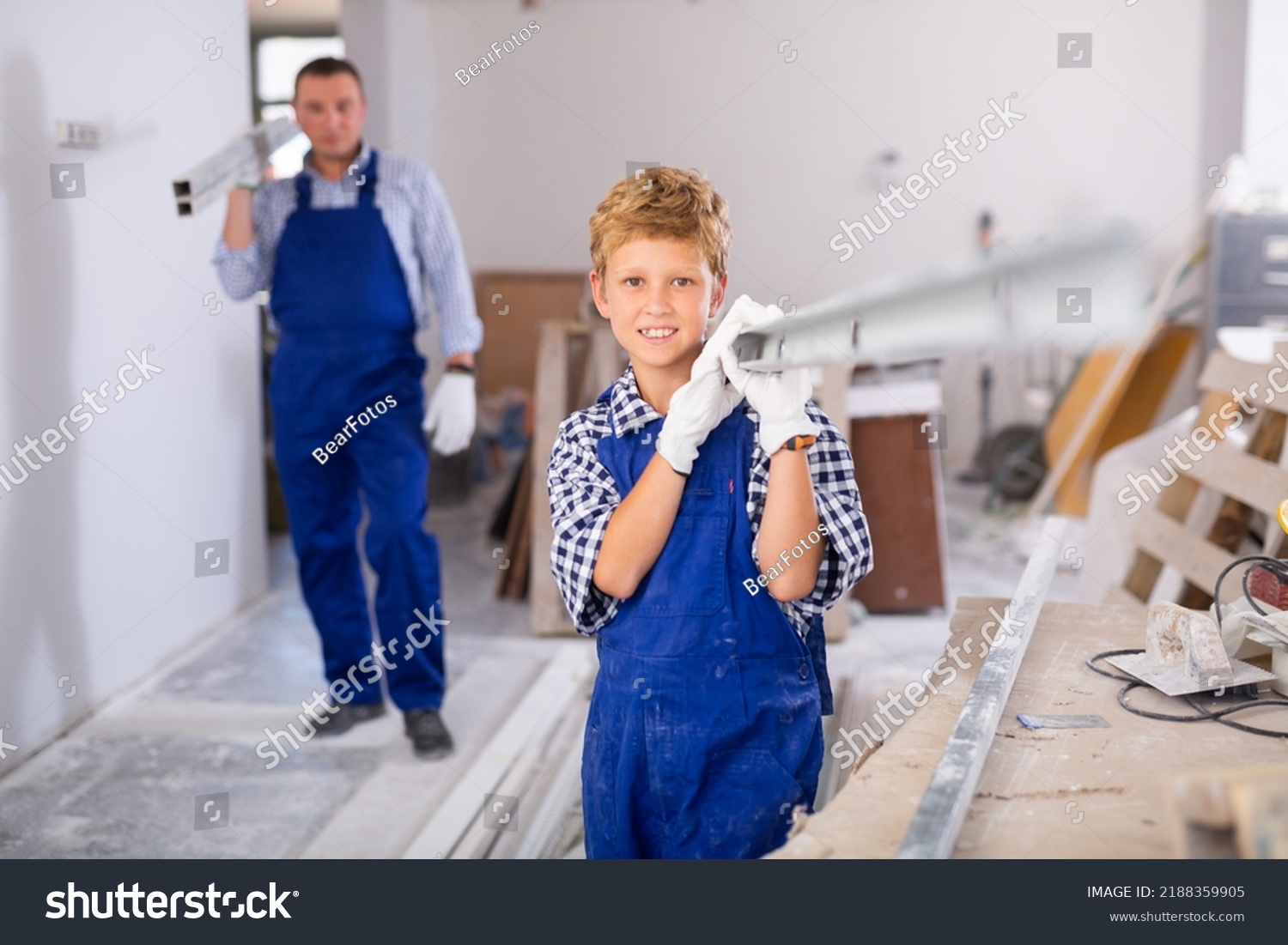 Boy Blue Overalls Carries Aluminum Profile Stock Photo 2188359905