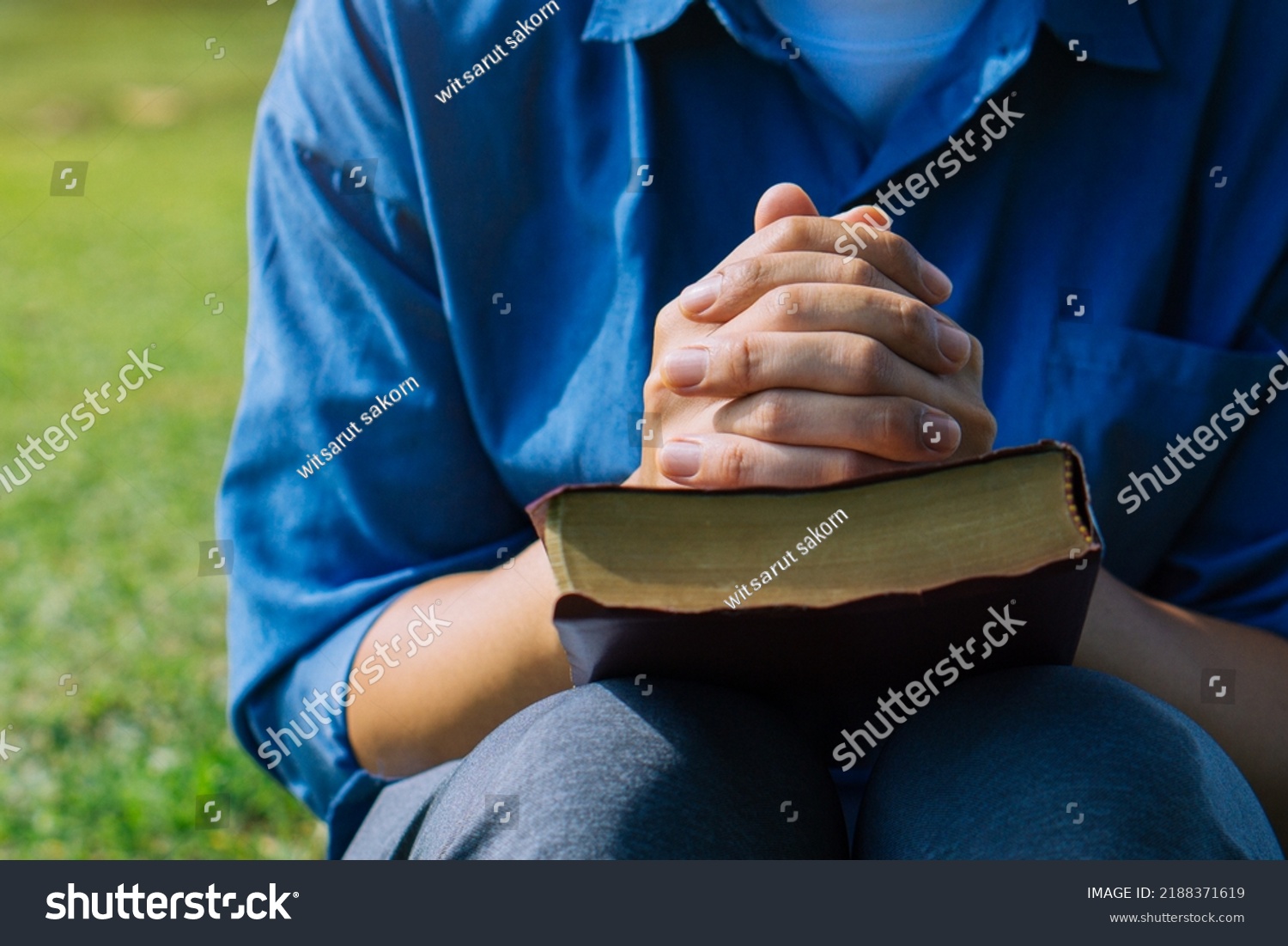 Young Prayer Sitting Outdoor Reading Bible Stock Photo 2188371619 ...