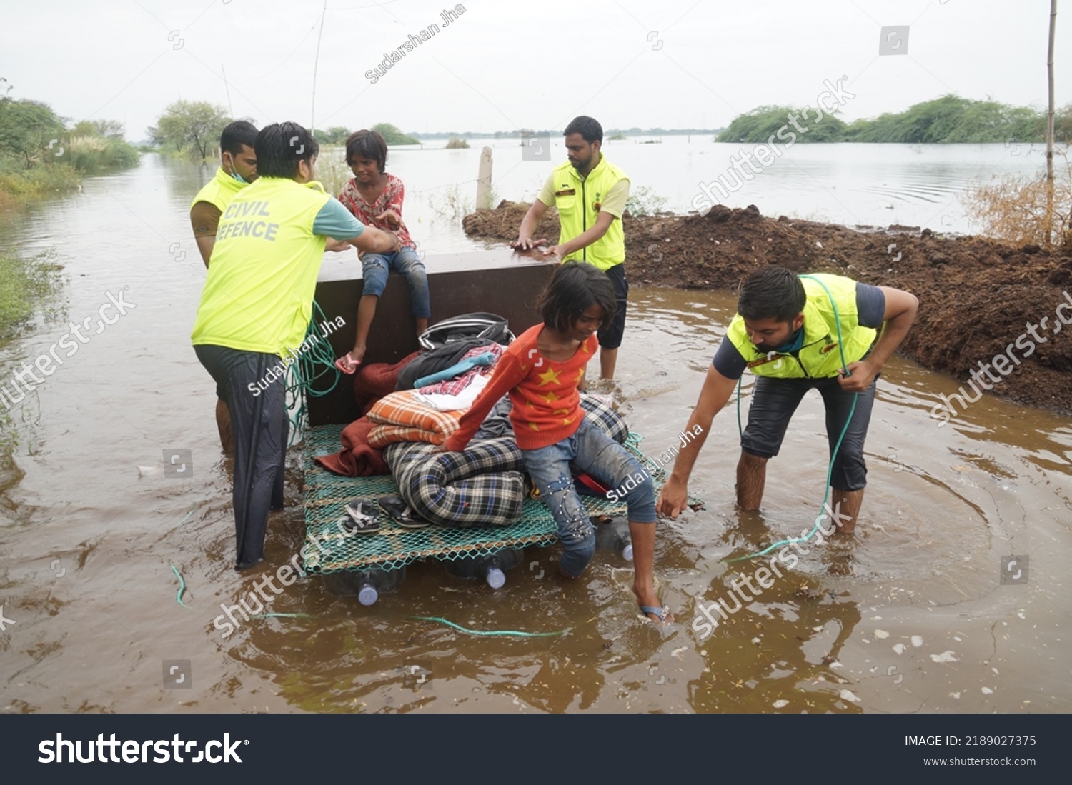 Civil Defense Team Rescuing Family Trapped Stock Photo 2189027375 ...