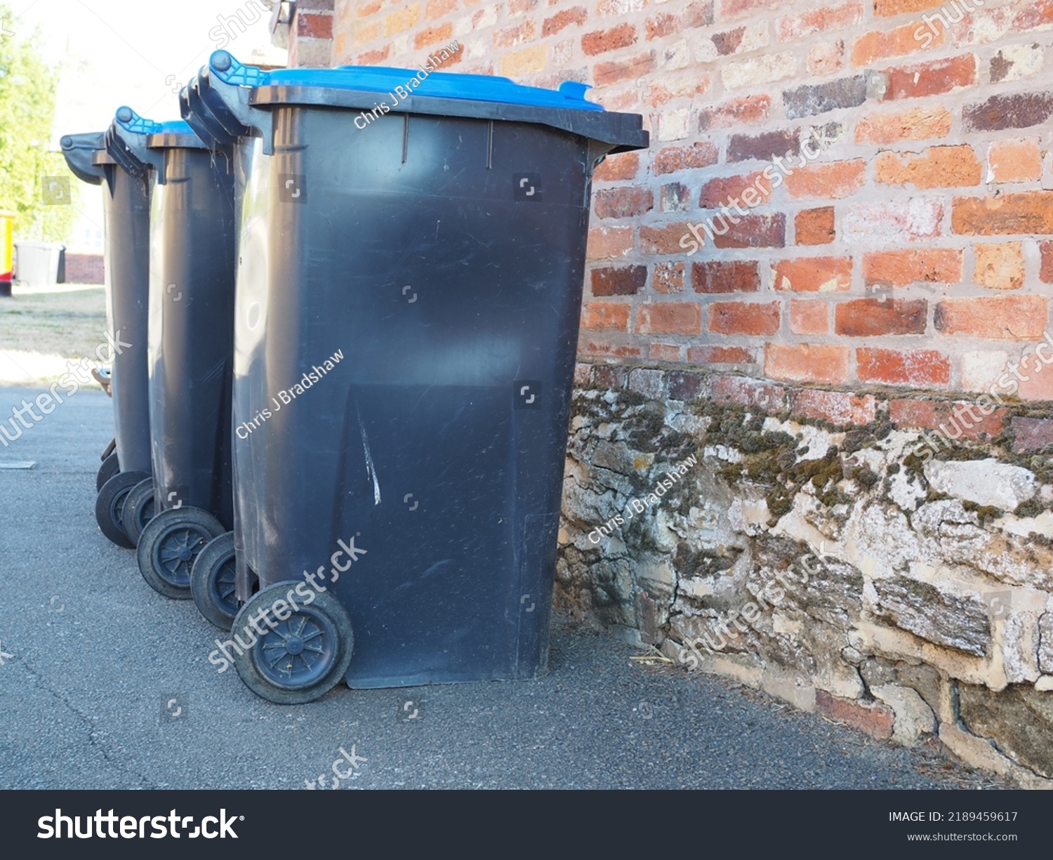 Black Plastic Wheelie Bins On Path Stock Photo 2189459617 | Shutterstock