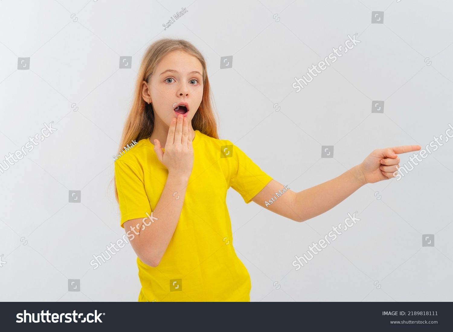 Impressed Teen Girl Pointing Finger Right Stock Photo 2189818111 ...