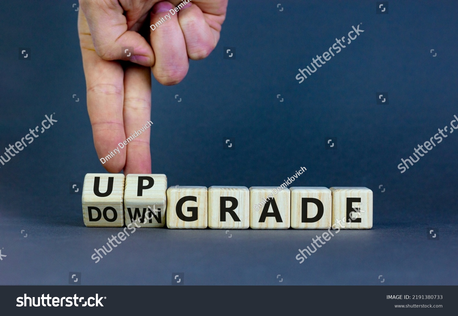 upgrade-downgrade-symbol-businessman-turns-wooden-stock-photo