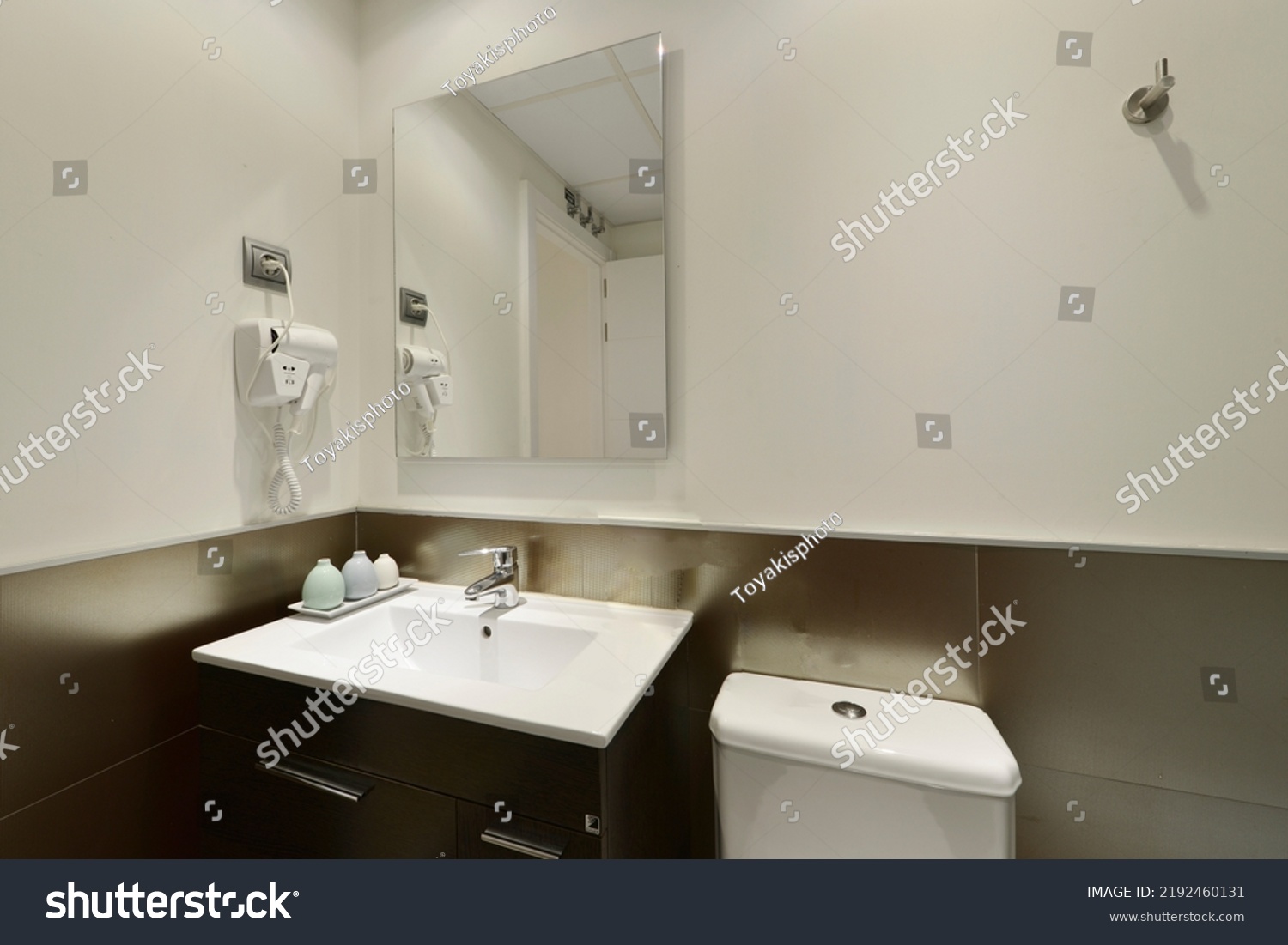 Modern Bathroom White Porcelain Sink Dark Stock Photo 2192460131   Stock Photo Modern Bathroom With White Porcelain Sink With Dark Wood Cabinet With Frameless Mirror On The Wall 2192460131 