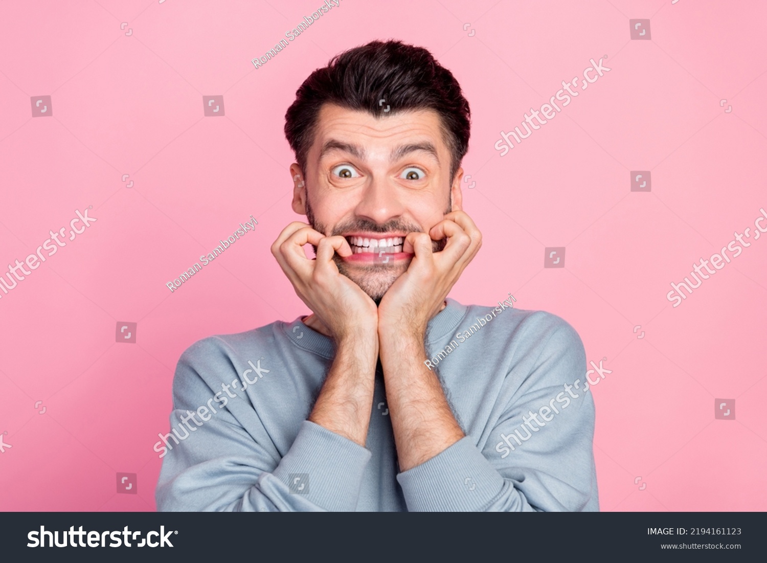 Portrait Impressed Terrified Man Biting Finger Stock Photo 2194161123