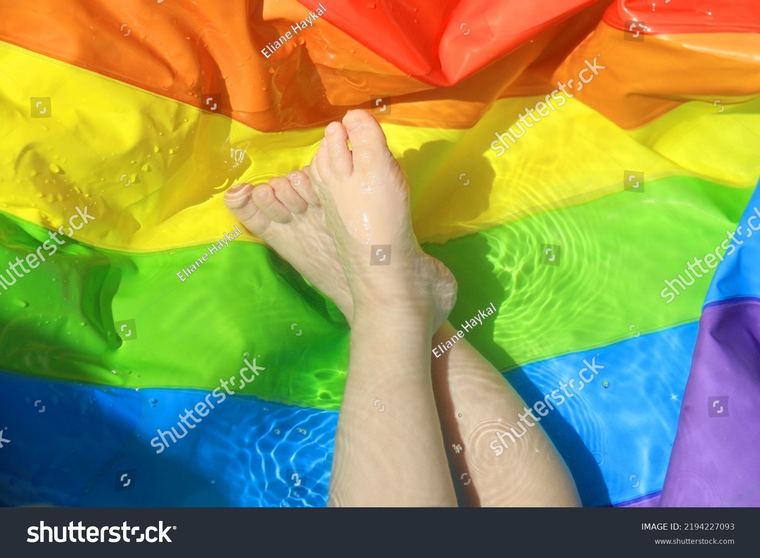 Toddler Feet Rainbow Colored Pool Splashing Stock Photo 2194227093