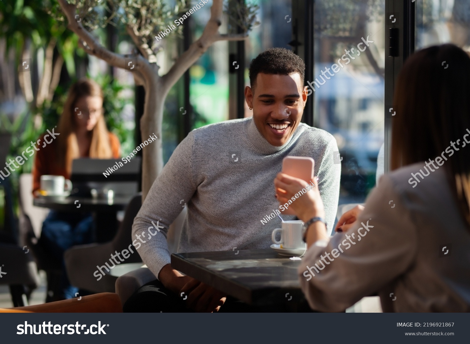 Two Friends Restaurant Talking Smiling Drinking Stock Photo 2196921867 ...