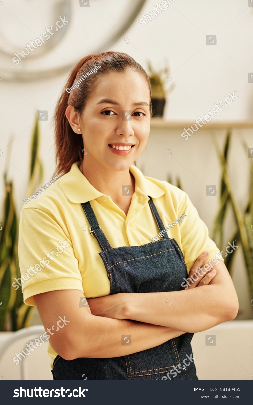 Cheerful Vietnamese Cafe Waitress Crossing Arms Stock Photo 2198189465