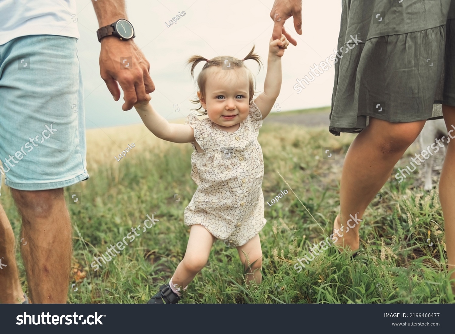 Happy Family Park Parents Hold Their Stock Photo 2199466477 | Shutterstock