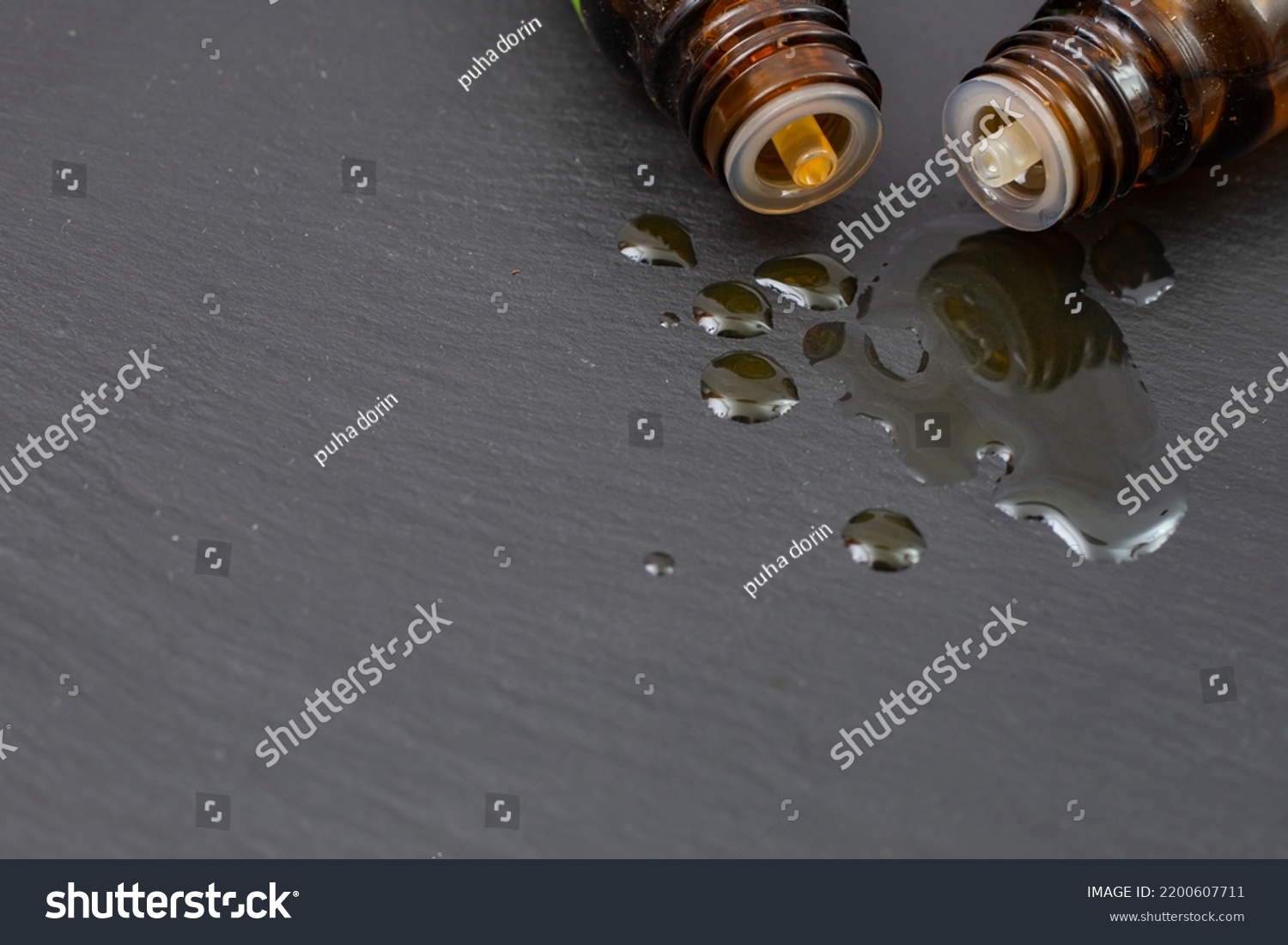 Two Dropper Bottles Essential Oil Spilling Stock Photo 2200607711 