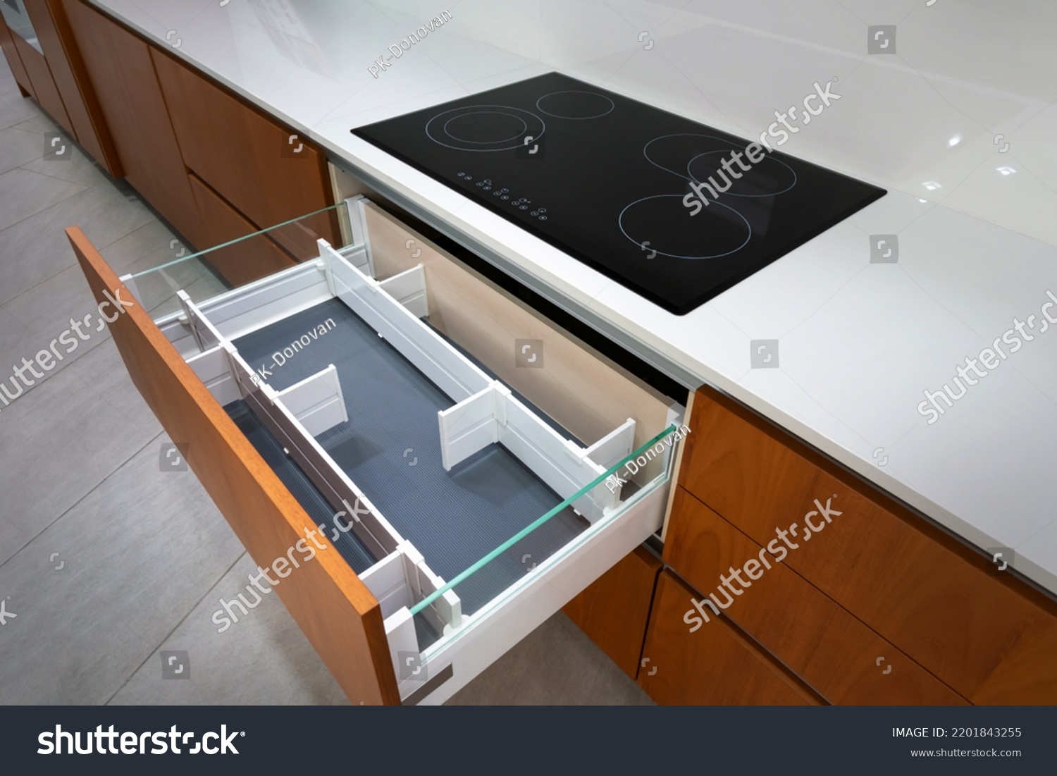 Modern Kitchen Black Induction Hob Install Stock Photo 2201843255   Stock Photo Modern Kitchen With Black Induction Hob Install On White Countertop Opened Drawer With Accessories 2201843255 