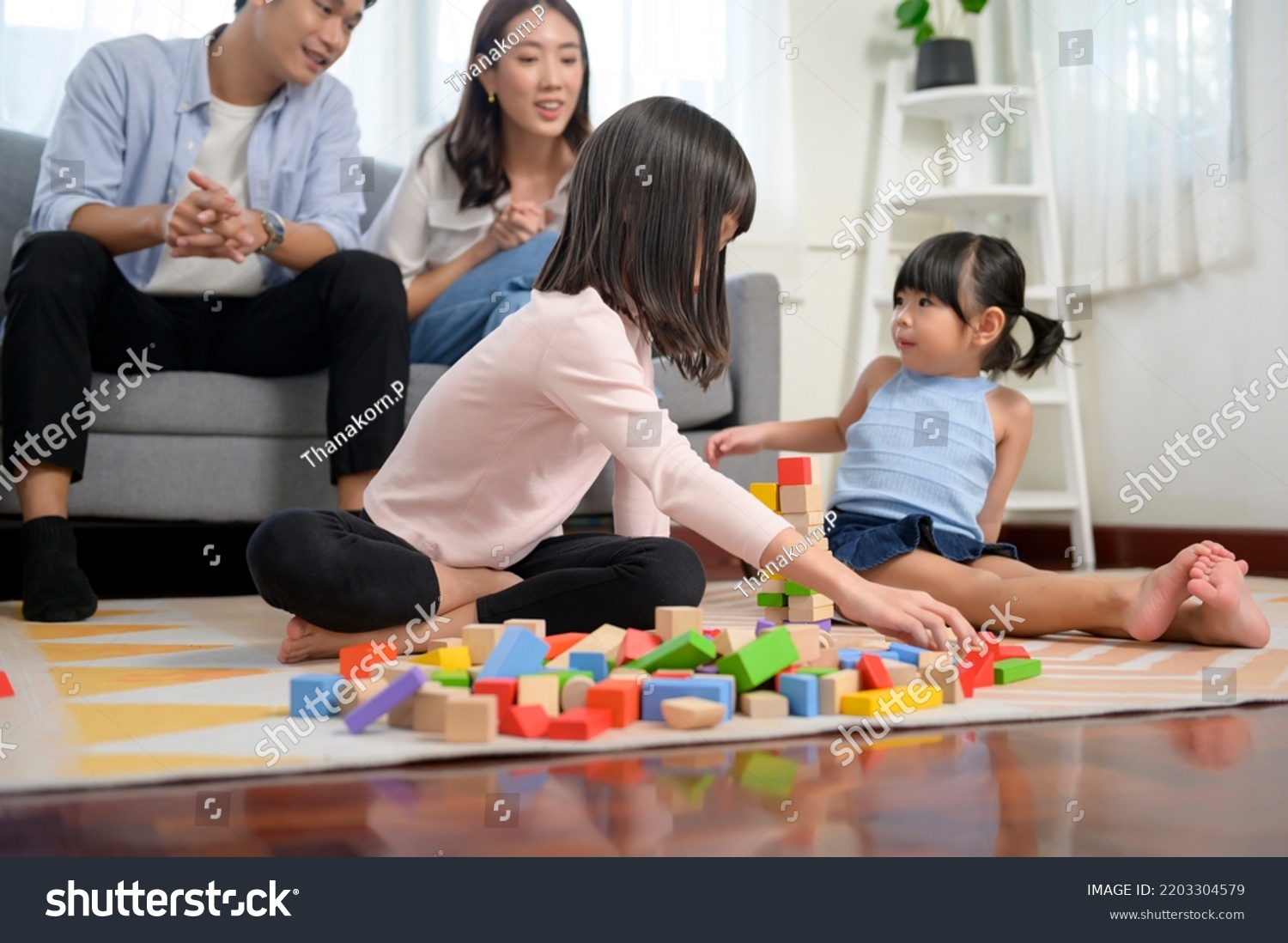 Asian Family Children Playing Building Tower Stock Photo 2203304579 ...