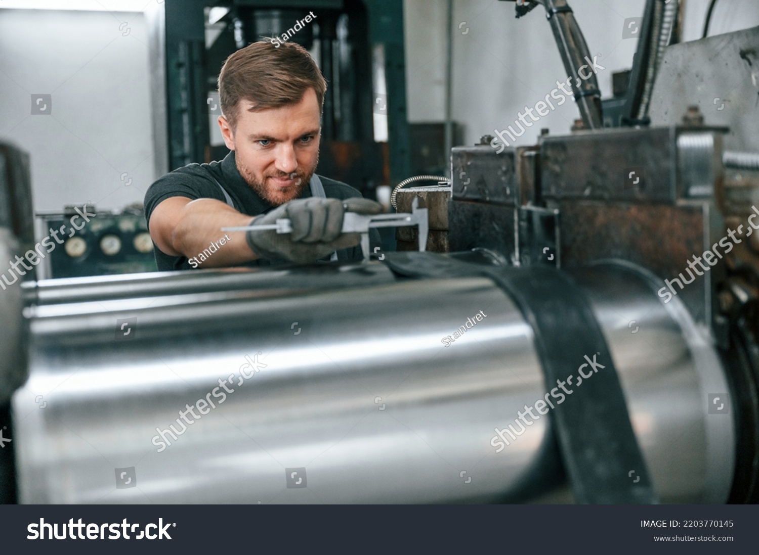 Using Measure Tool Man Uniform Workstation Stock Photo 2203770145