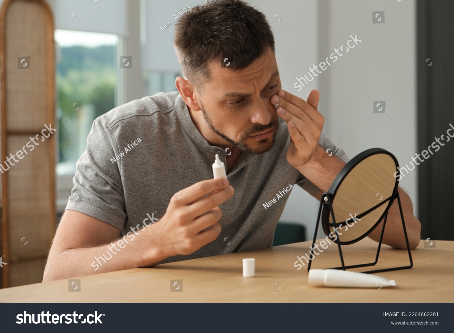 Sleep Deprived Man Covering Dark Circles Stock Photo 2204662281 ...