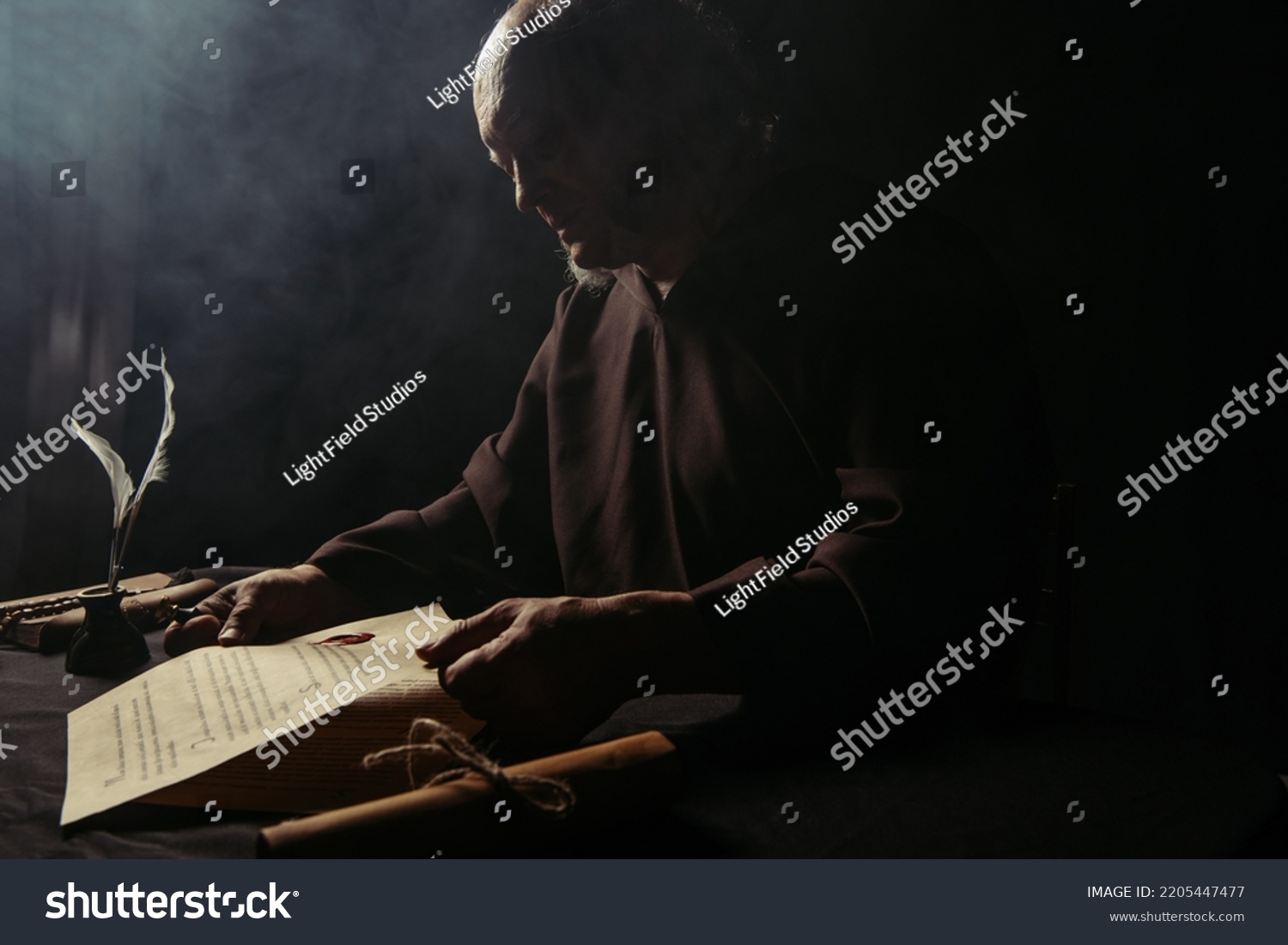 Medieval Monk Black Cassock Holding Ancient Stock Photo 2205447477 ...