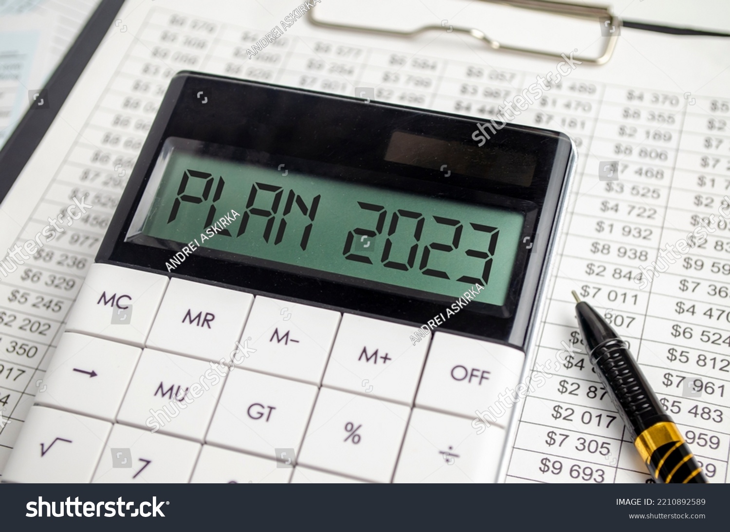 Stock Photo Calculator With Year Plan On Chart And Pen 2210892589 