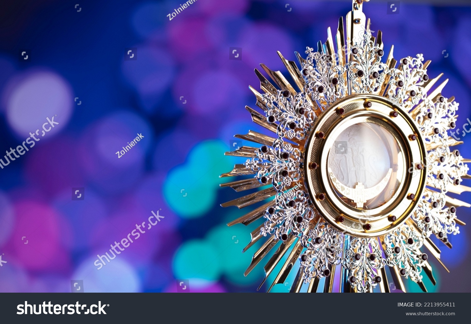 catholic-symbols-on-bokeh-background-stock-photo-2213955411-shutterstock