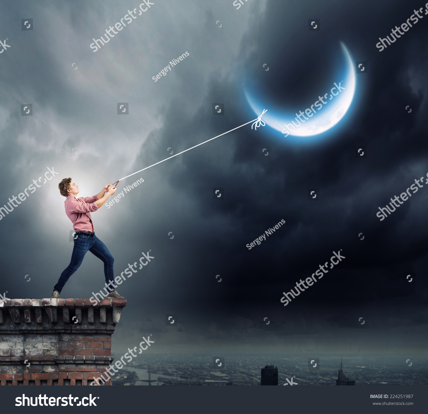 young-man-casual-catching-moon-rope-stock-photo-224251987-shutterstock
