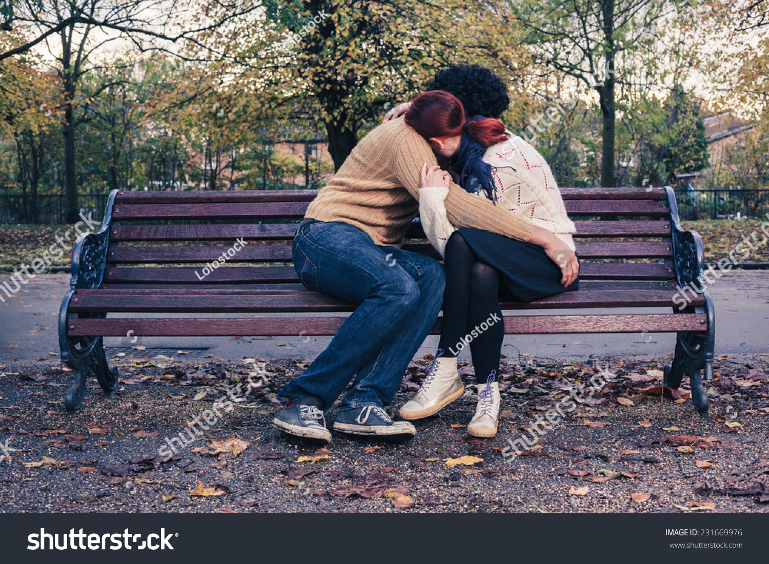 Sad Woman Sitting On Bench Image