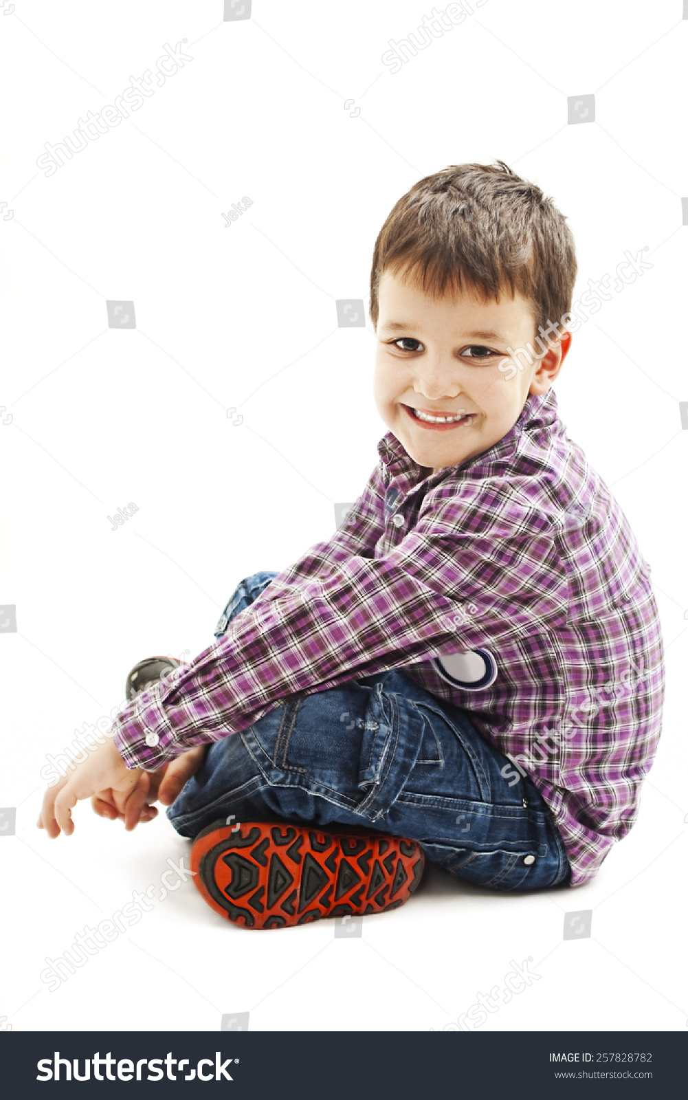 Smiling Little Boy Sitting Down On Stock Photo 257828782 | Shutterstock