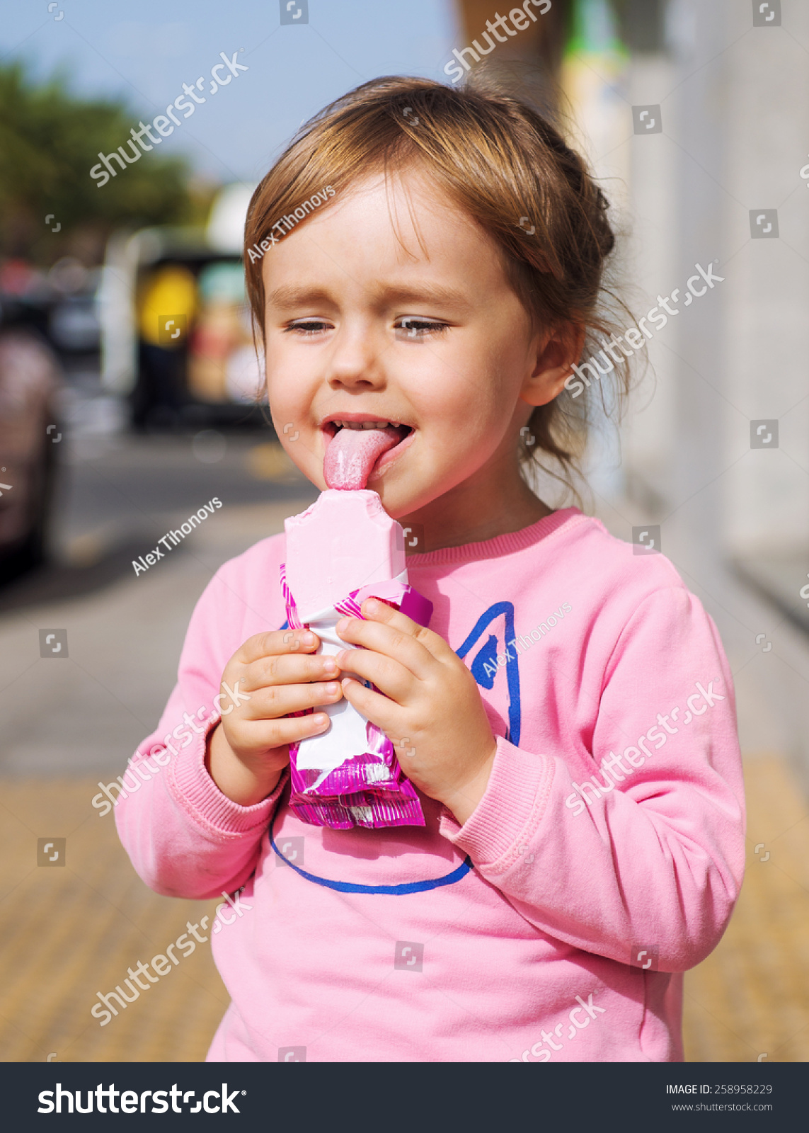 Little Girl Licking Ice Cream Stock Photo 258958229 | Shutterstock