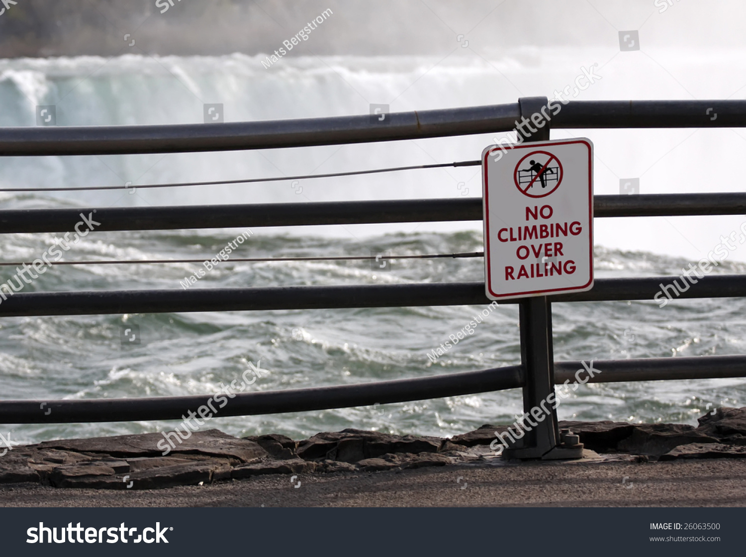 stock-photo-no-climbing-over-railing-warning-sign-at-niagara-falls-good-idea-26063500.jpg