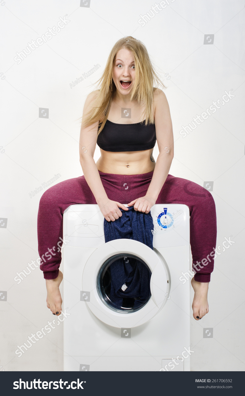 Girl Sitting On Washing Machine
