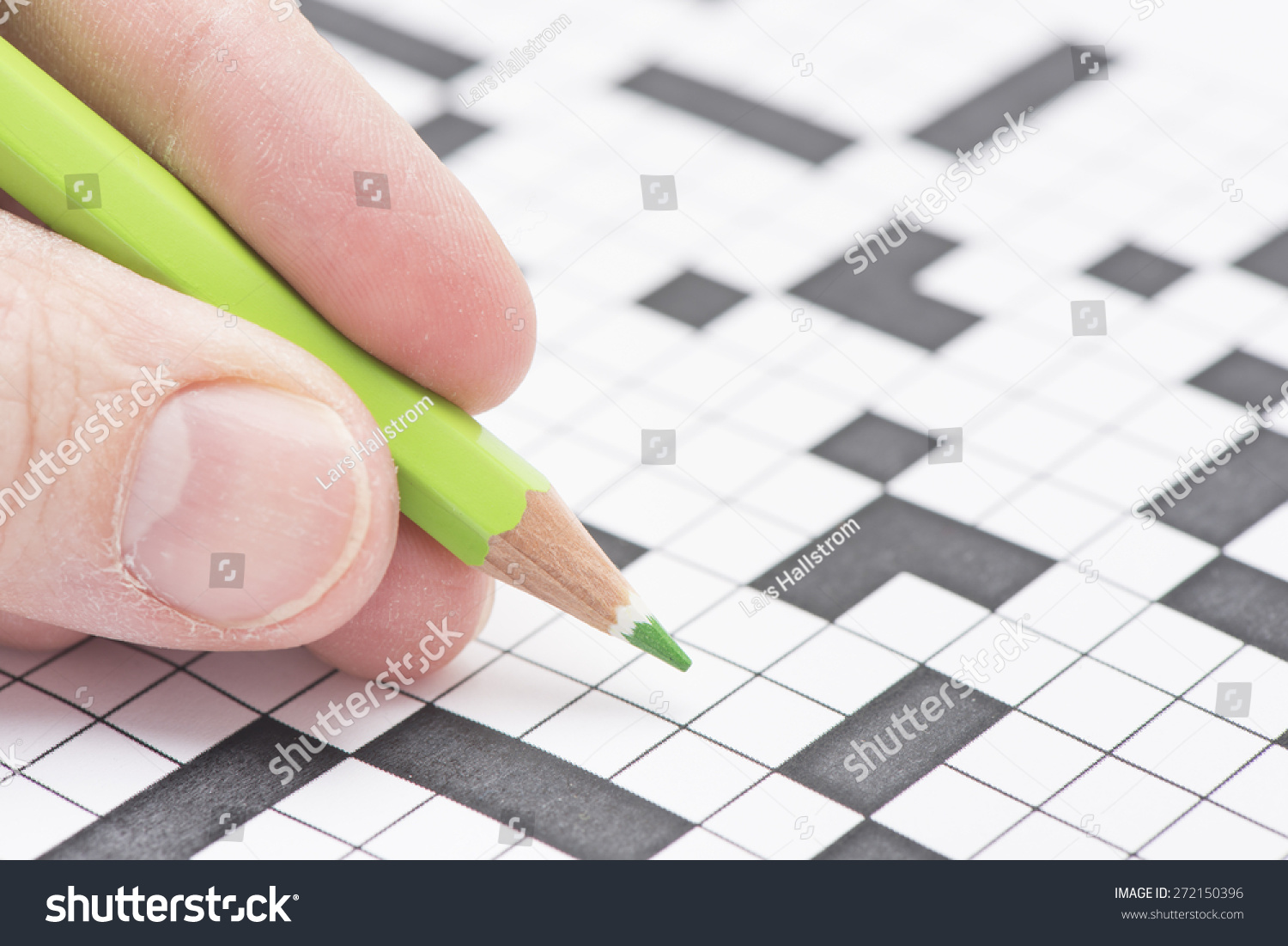 Closeup Crossword Puzzle Hand Holding Green Stock Photo 272150396