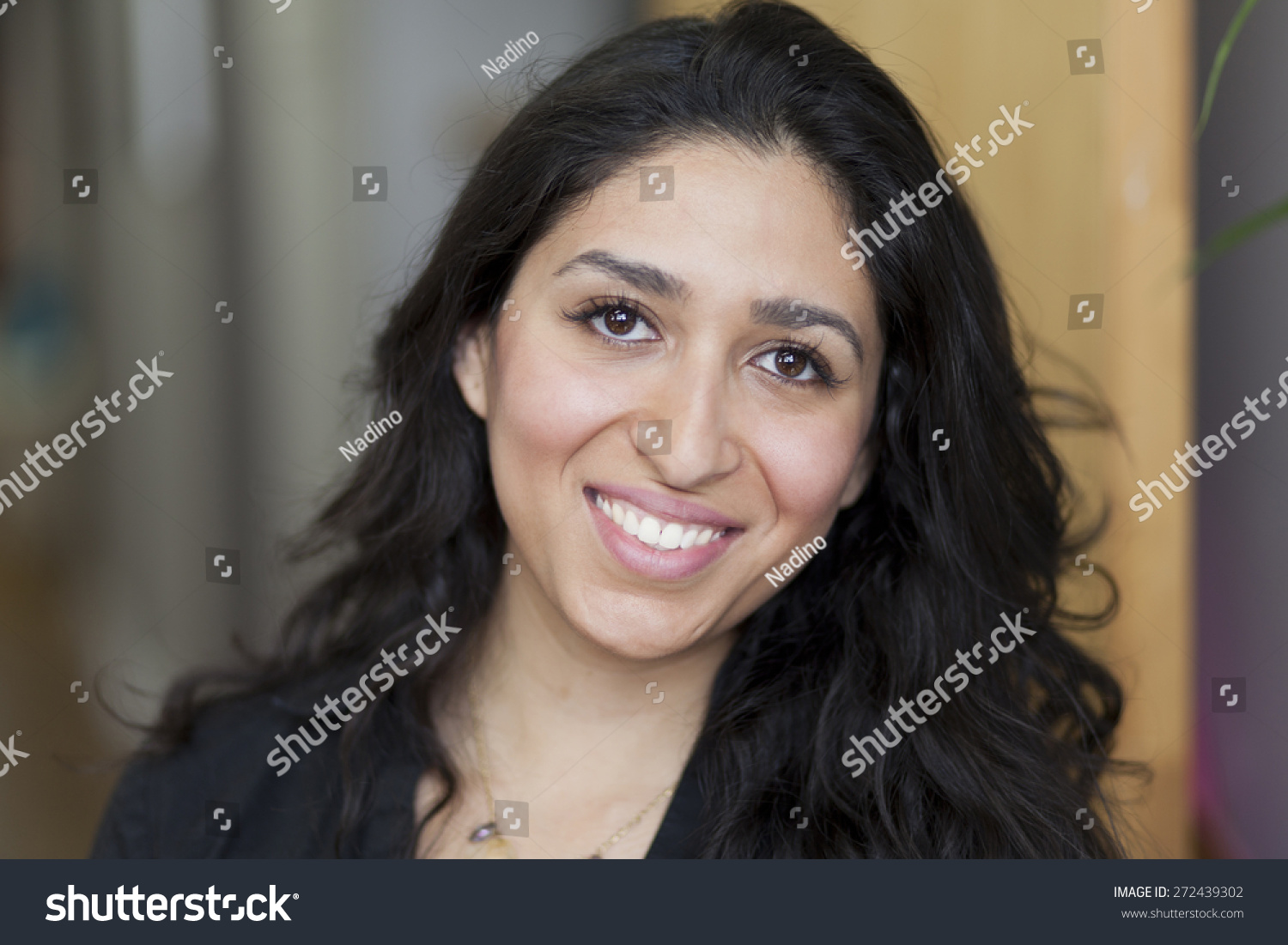 closeup-spanish-woman-smiling-stock-photo-272439302-shutterstock