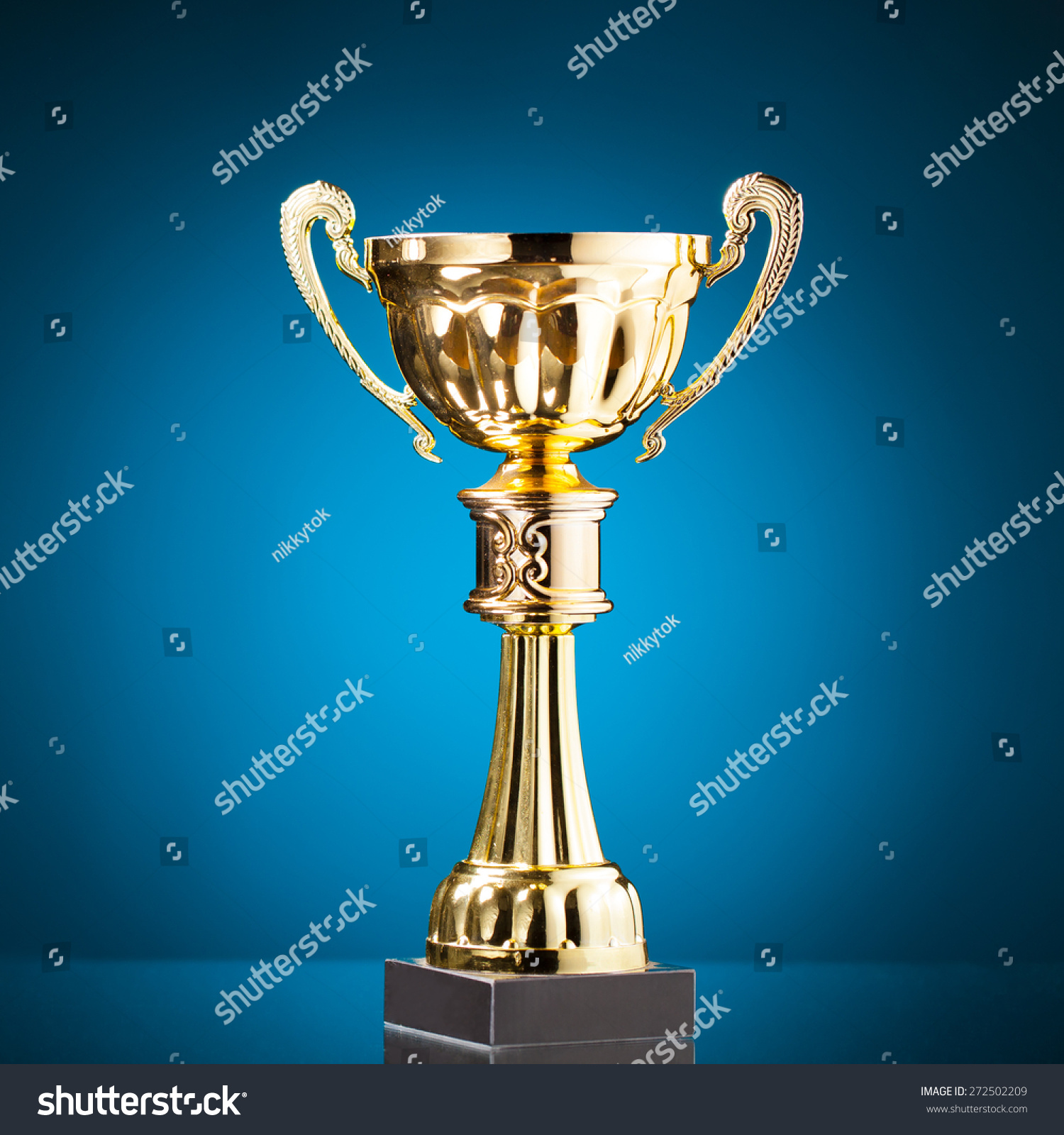 Gold Cup Trophy On Blue Background Stock Photo 272502209 | Shutterstock