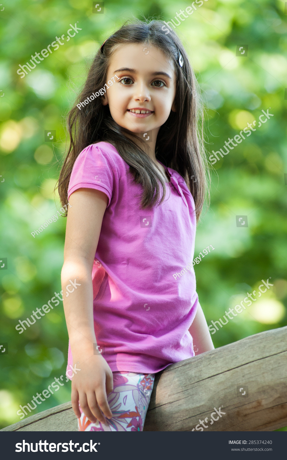 Cute Little Girl Sitting Outdoors Against Stock Photo 285374240 ...