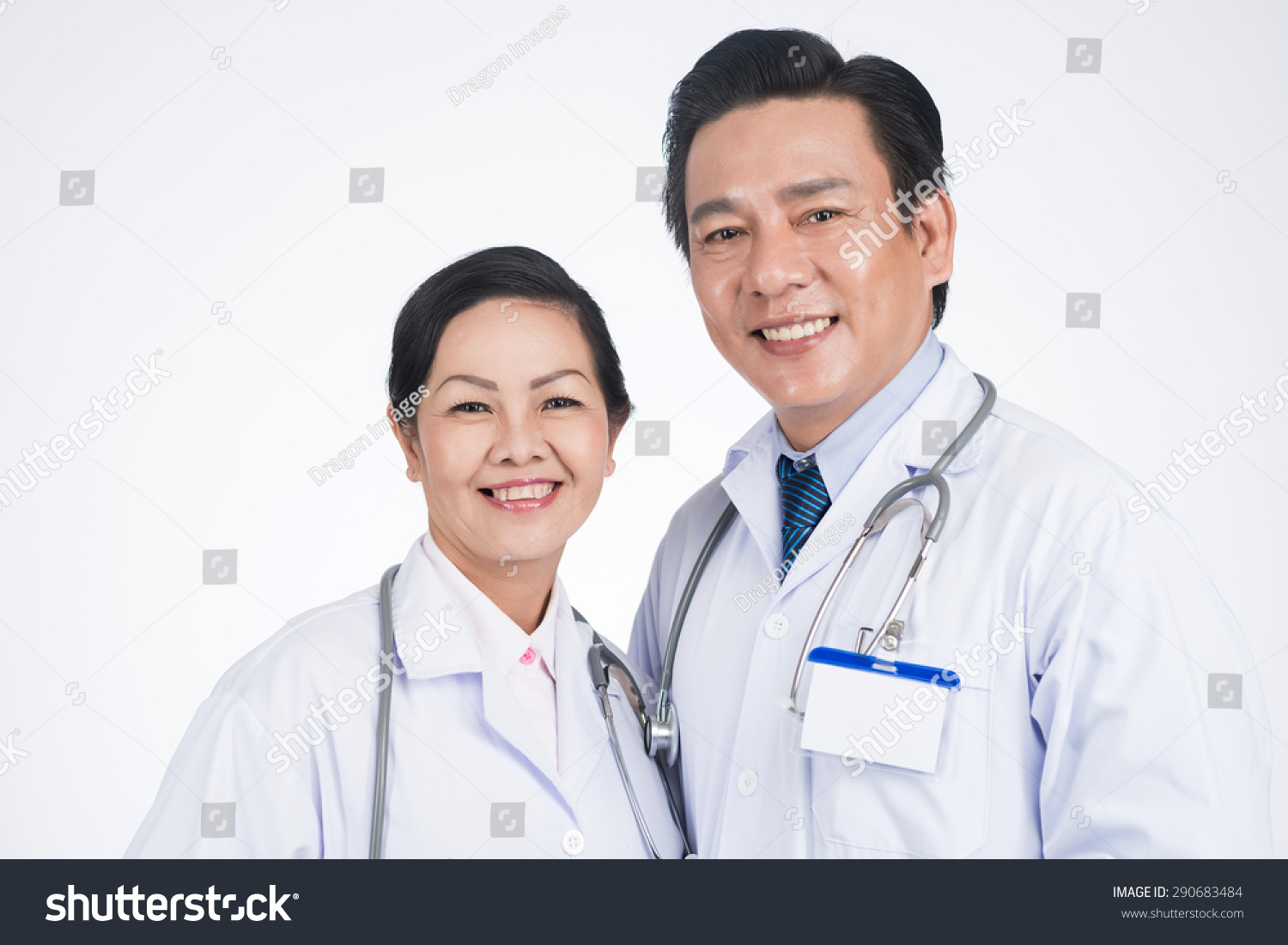 Smiling Mature Vietnamese Doctors