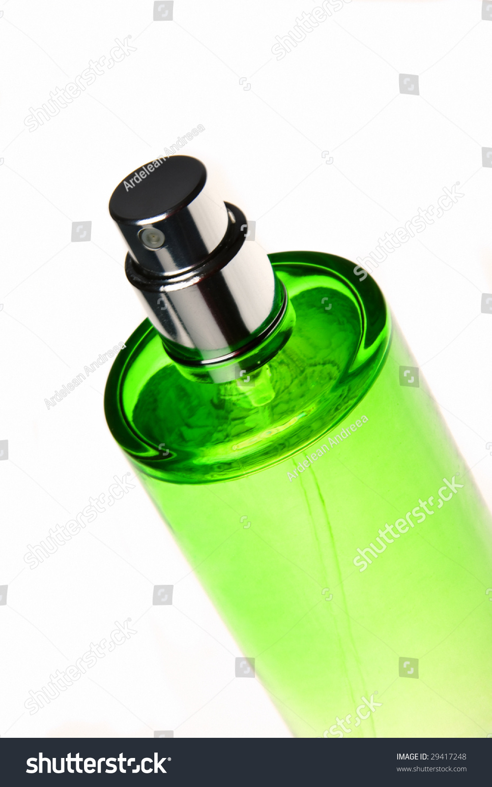 Stock Photo A Single Green Bottle Of Perfume Isolated On White 29417248 