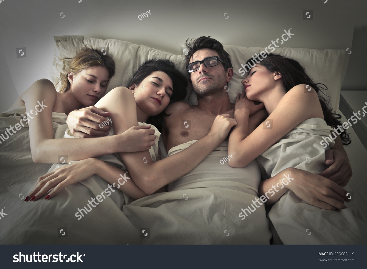 https://image.shutterstock.com/shutterstock/photos/295683119/display_1500/stock-photo-man-sleeping-with-three-girls-295683119.jpg