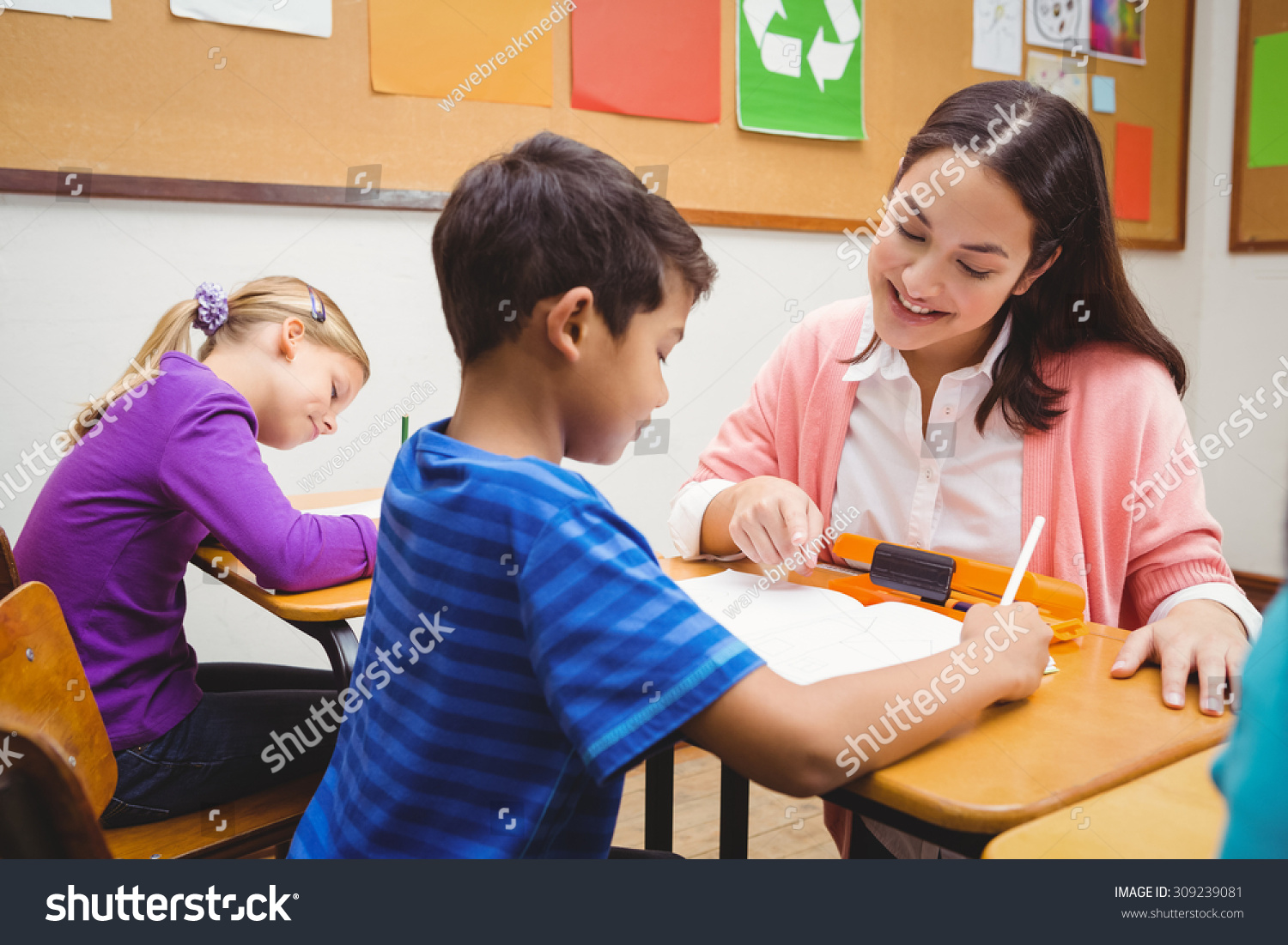 Happy Teacher Helping Her Students Elementary Stock Photo 309239081 ...