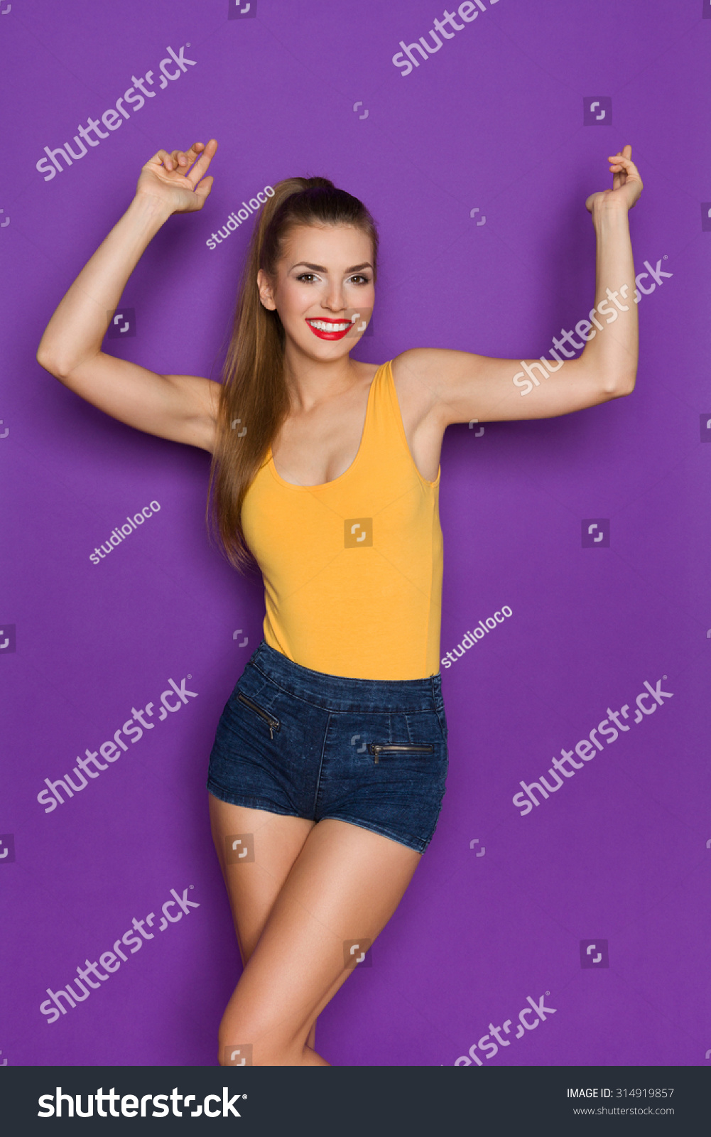 beautiful-woman-arms-outstretched-stock-photo-314919857-shutterstock