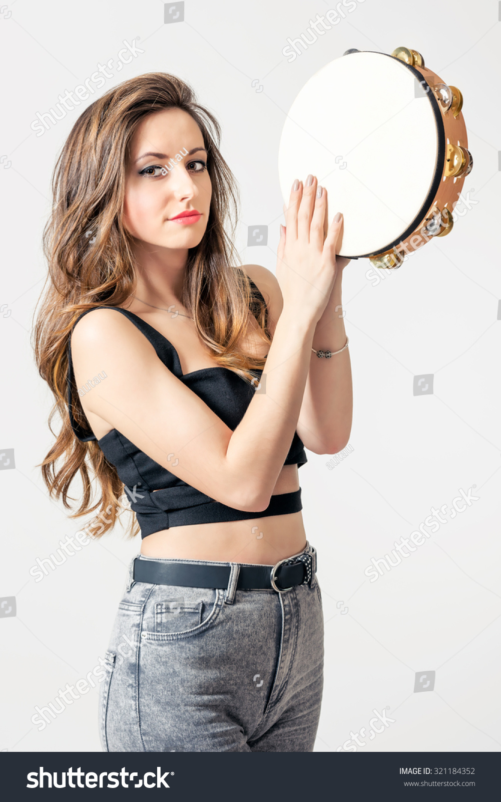 gypsy playing tambourine