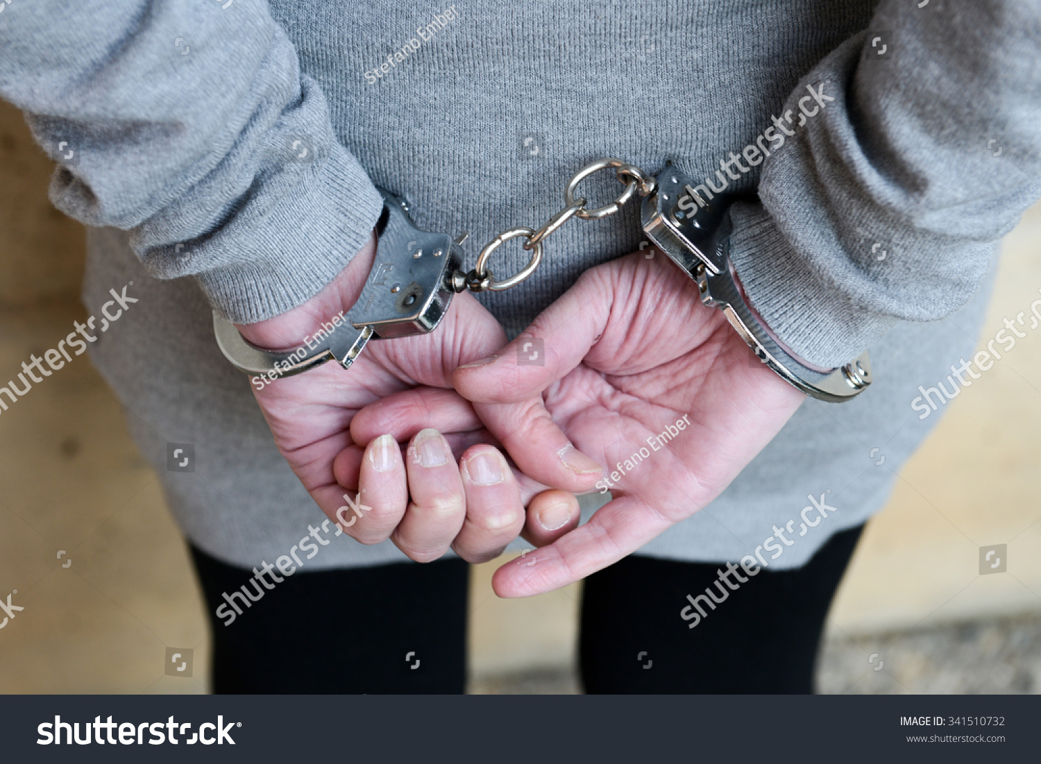 Arrested Woman Handcuffs Behind Her Back Stock Photo 341510732 Shutterstock...